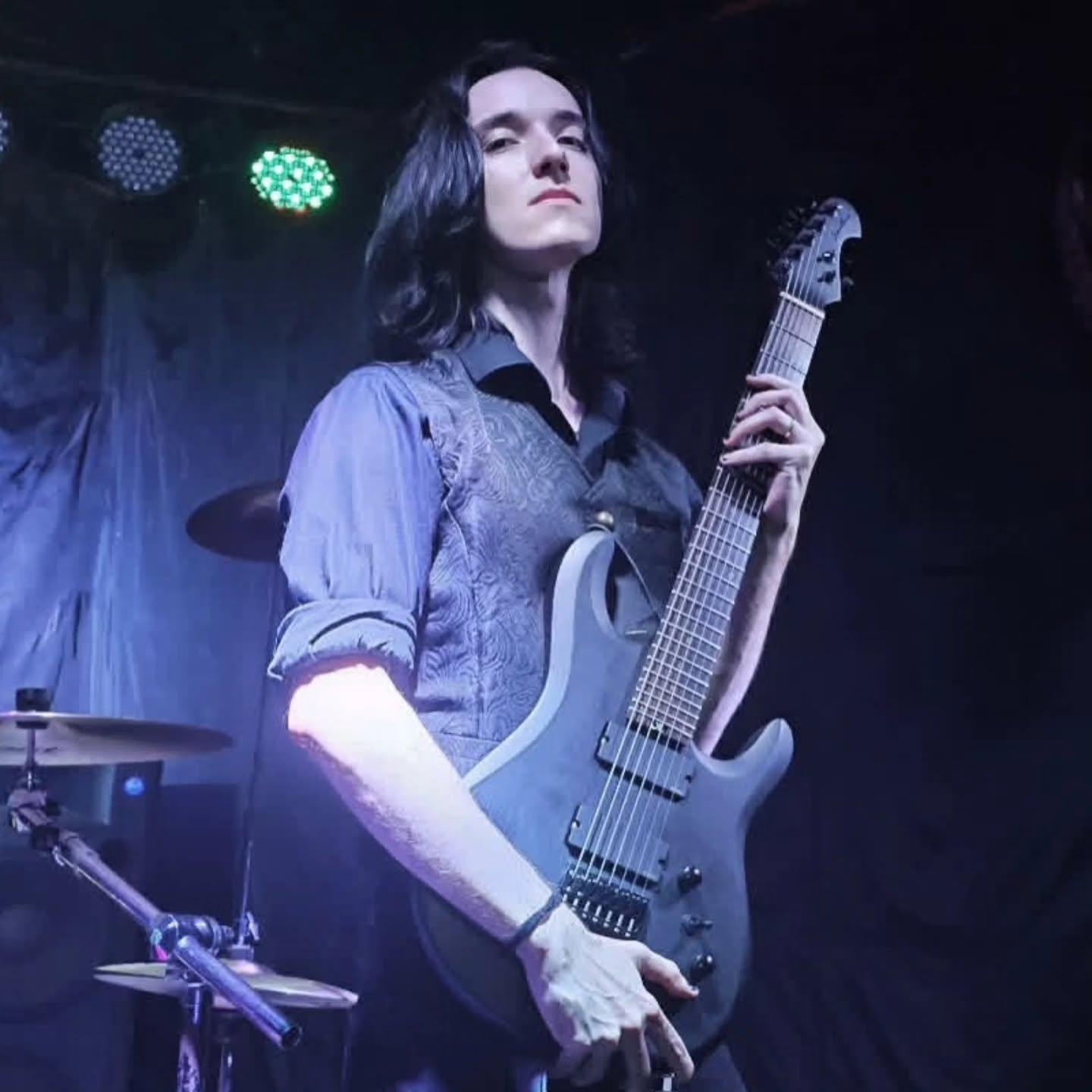 Nikolayevsk with his 7-string signature guitar